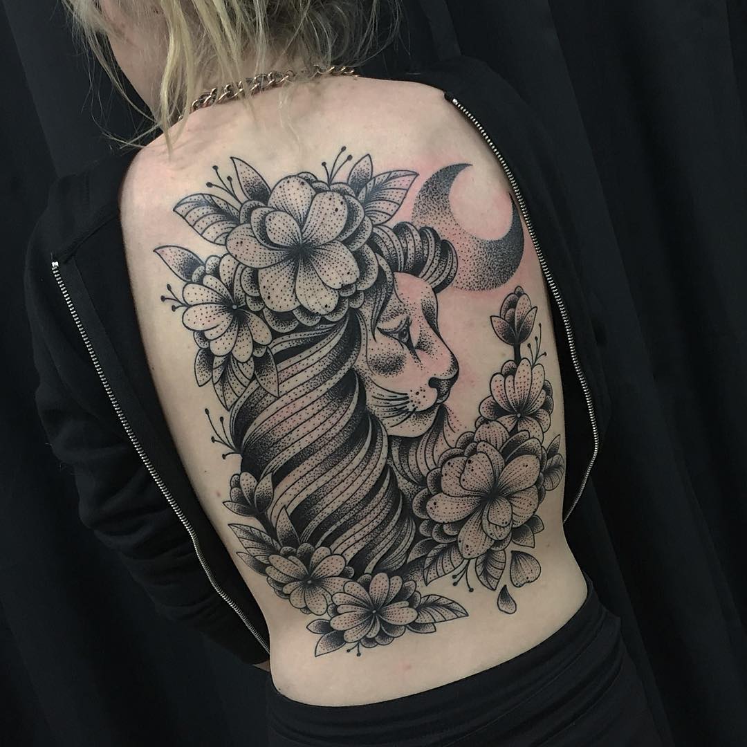  lion tattoo with flowers