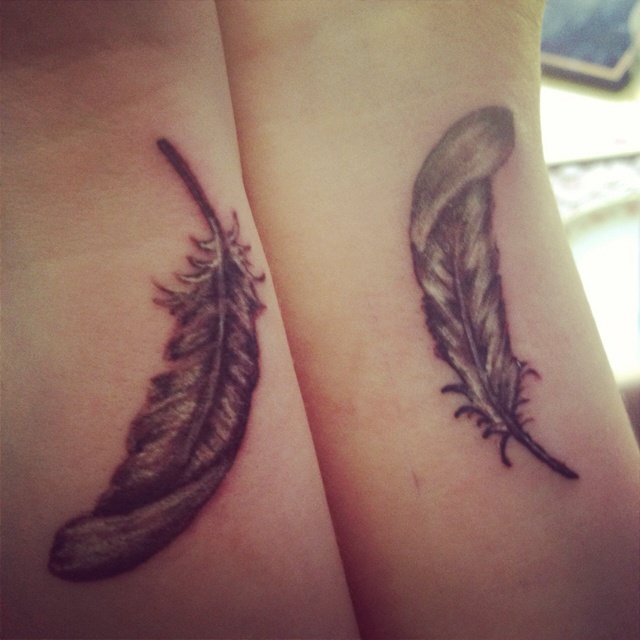  feathers matching tattoos