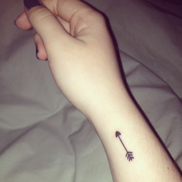arrow tattoo on wrist