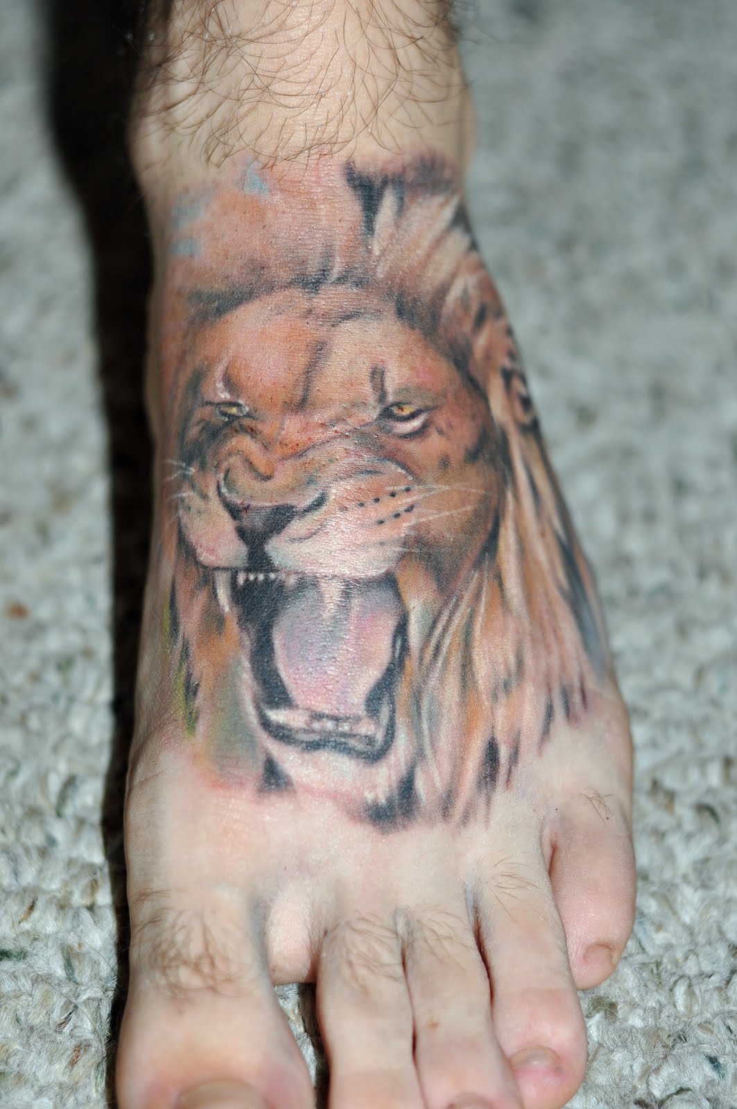  lion tattoo foot