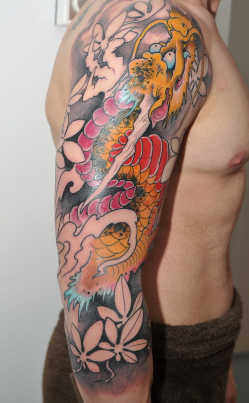dragon tattoo with flowers