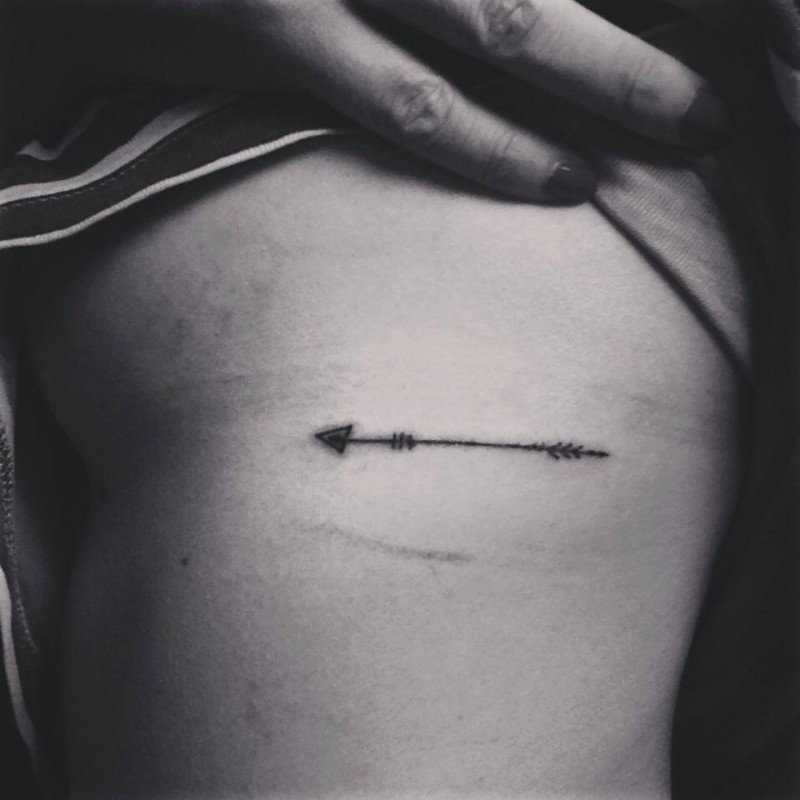 arrow tattoo on side