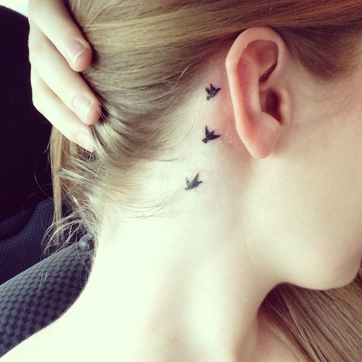 bird tattoos behind ear