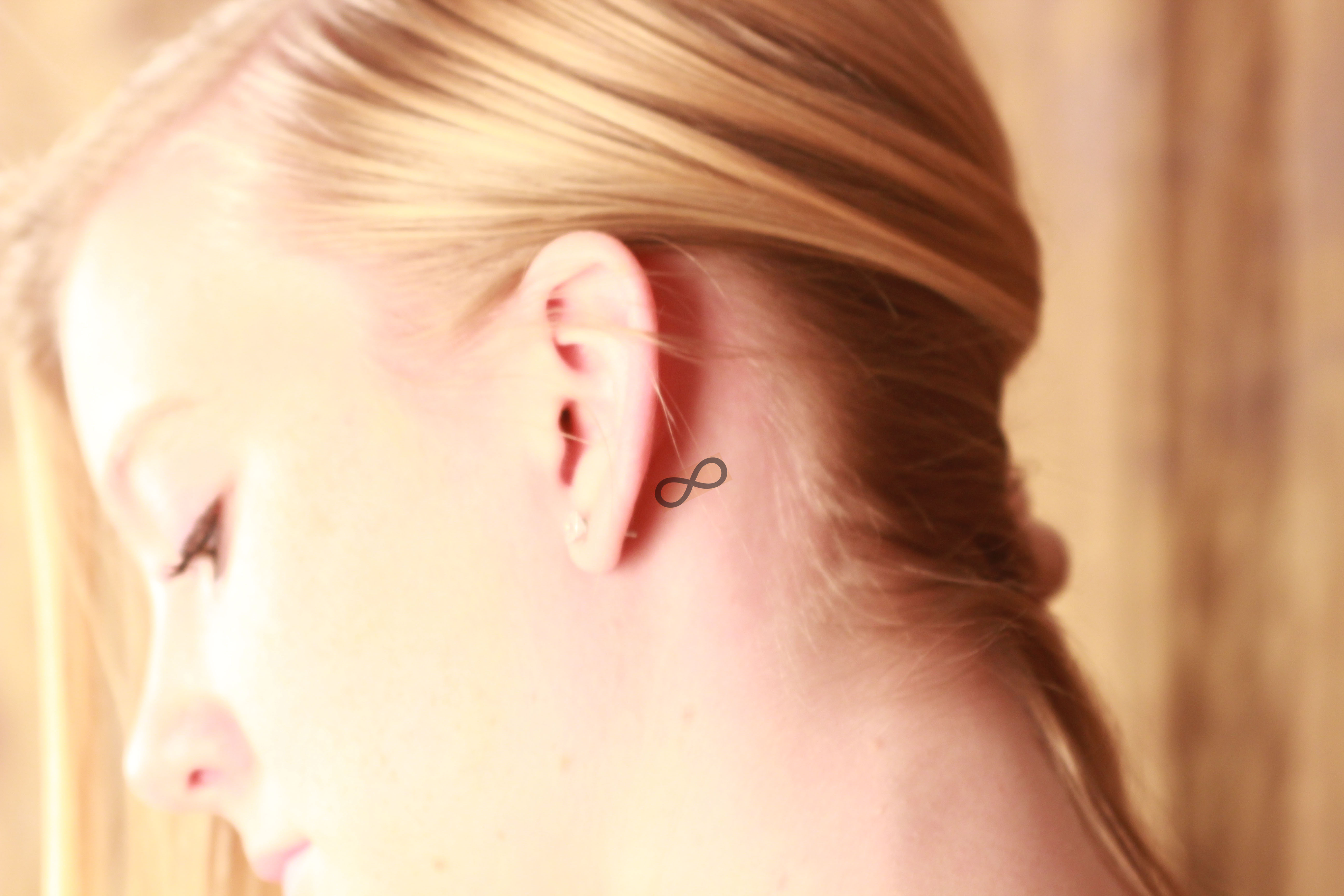  infinity tattoo behind ear
