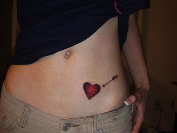  arrow tattoo hip