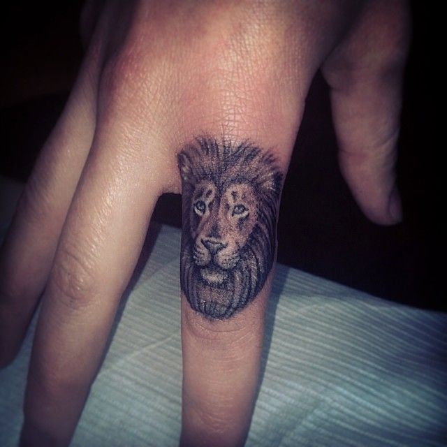  lion finger tattoos
