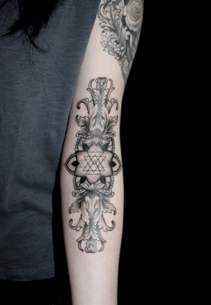 geometric forearm tattoos